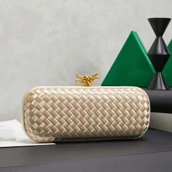 Bottega Veneta Intreccio Knot Clutch Champagne Gold Clutch