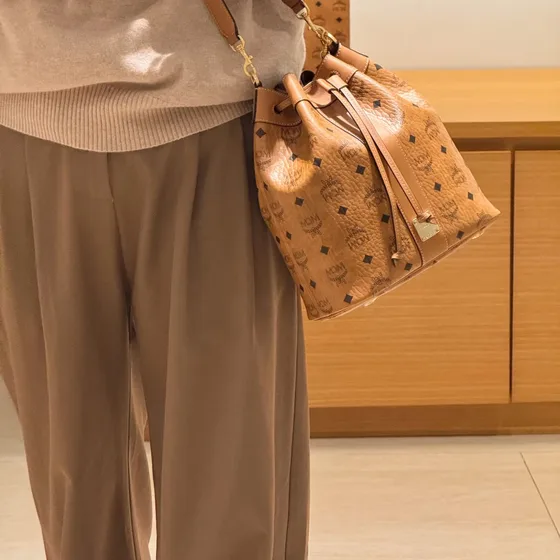 MCM Aren Visetos Drawstring Bucket Bag Cognac Crossbody