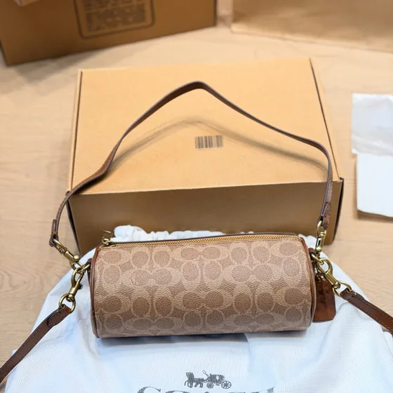 Coach Nolita Barrel Bag In Signature Kanvas Tan/Coklat Shoulder Bag