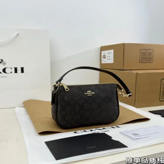 Coach Nolita 19 In Signature Canvas Black Brown 19 11 5cm Shoulder Bag