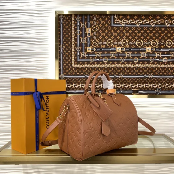 Louis Vuitton Speedy Bandoulière Brun Tophåndtag