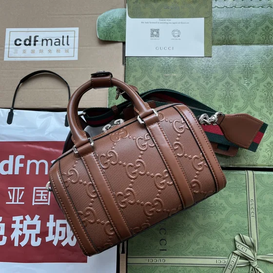 Gucci Gg Embossed Mini Duffle Bag Brown Top Handle