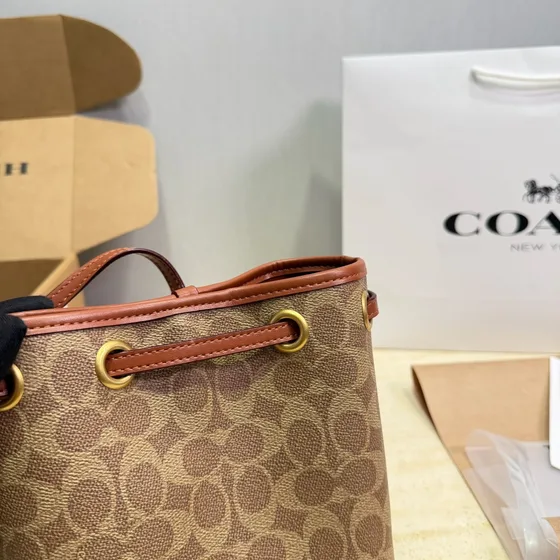 Coach Rowan Bøtteveske In Signature Lerret Khaki/Saddle Crossbody