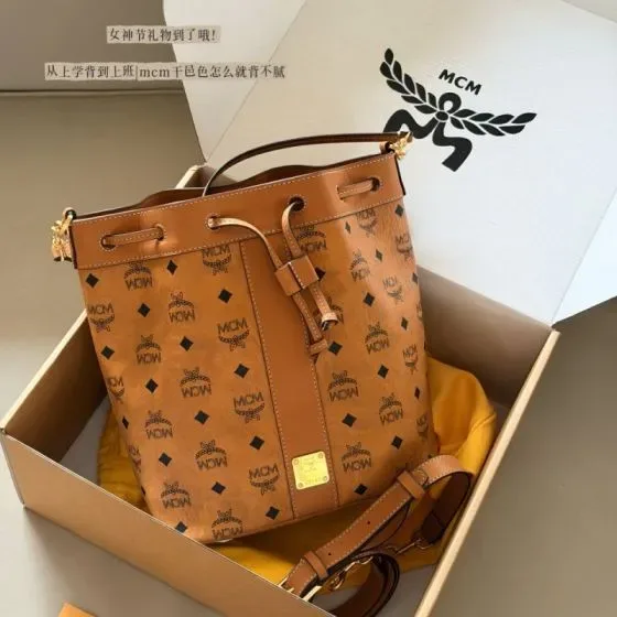 MCM Aren Visetos Drawstring Bucket Bag Cognac Crossbody