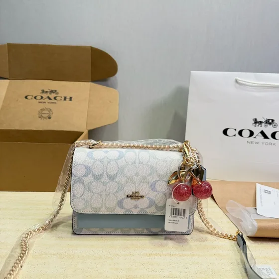 Coach Mini Klare Crossbody In Signature Canvas Light Pink Yellow White Crossbody