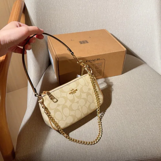 Coach Nolita 19 In Signature Canvas Beige Ivory 19 11 5cm Shoulder Bag