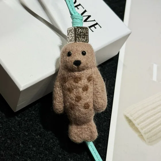 Loewe Seal Felt Bag Charm Beige Etui