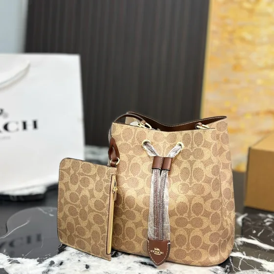 Coach Rowan Sac seau Marron Signature Coated Toile/Beige Sign Crossbody