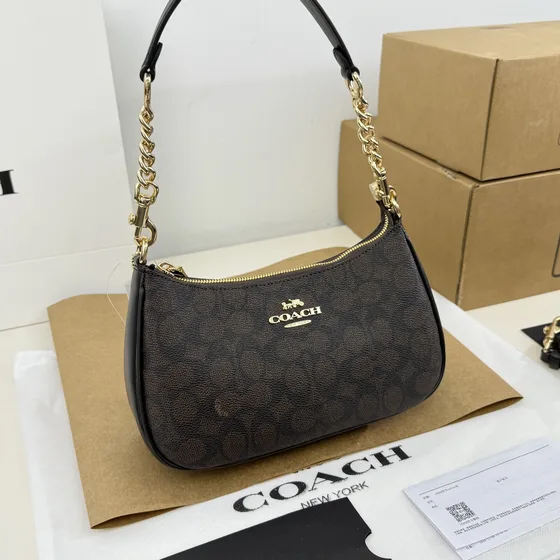 Coach Teri Bolso bandolera In Signature Lona Marrón Negro Bolso bandolera