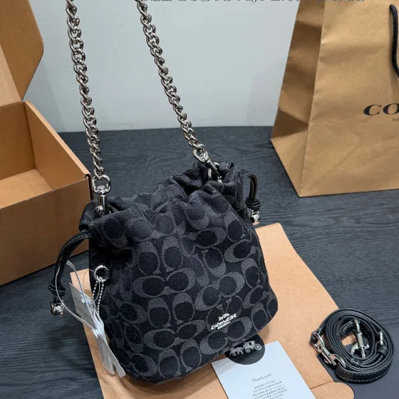 Coach Drawstring Chain Crossbody Bucket Bag In Signature Denim Black Crossbody