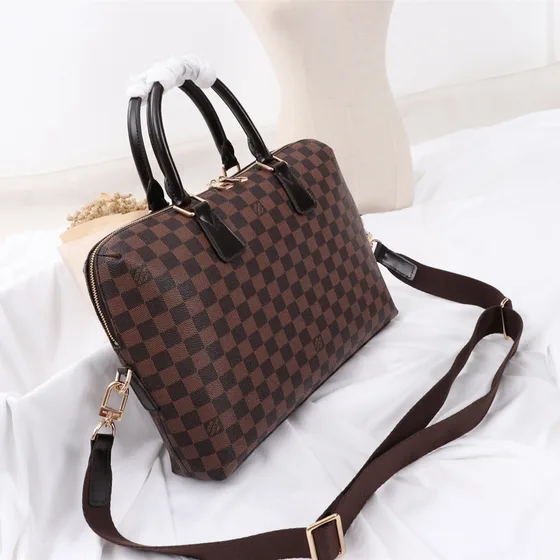 Louis Vuitton Keepall Bandouli re Brown Top Handle