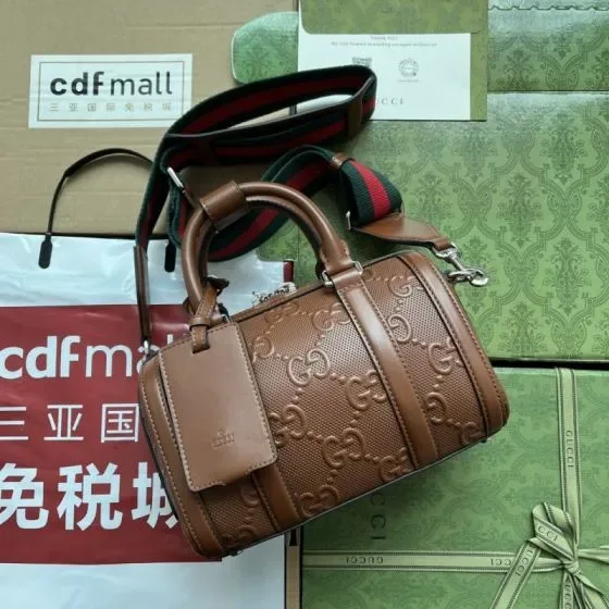 Gucci Gg Embossed Mini Duffle Bag Brown Top Handle