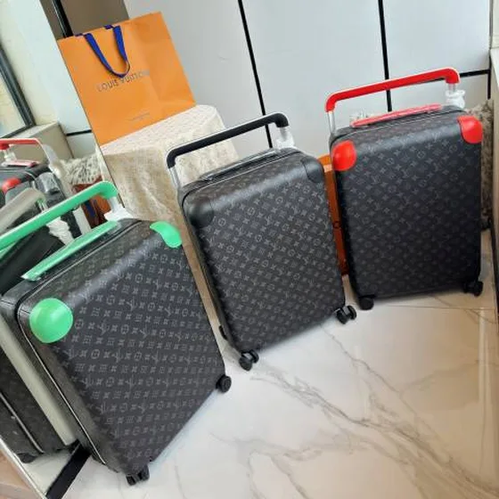 Louis Vuitton suitcase Monogram Eclipse with orange trim 55x38x21cm travel