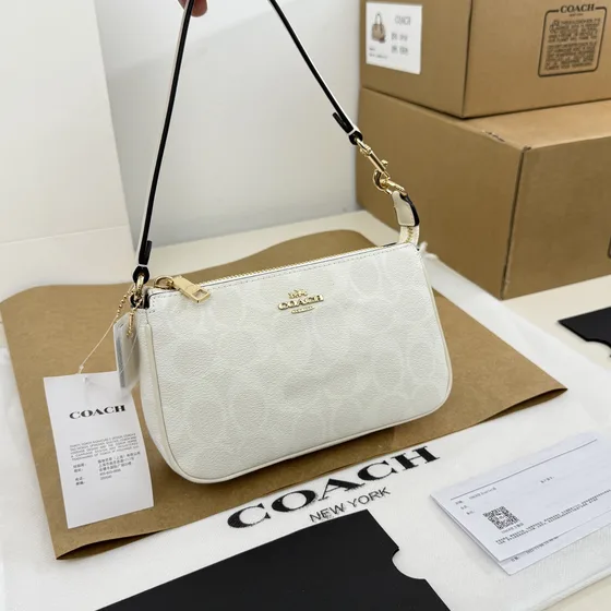 Coach Nolita 19 In Signature Tuval Dark Kahverengi/Siyah Omuz çantası