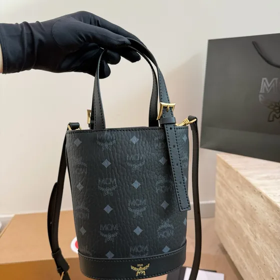 MCM Aren Visetos Mini Bucket Bag Cognac Black Crossbody