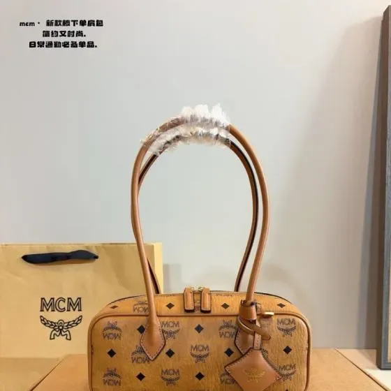 MCM Aren Boston Bag In Visetos Cognac Brown Top Handle