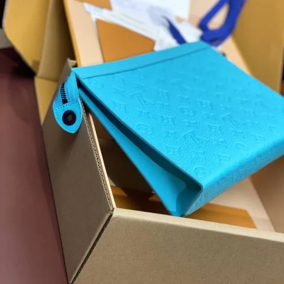 Louis Vuitton Pochette Voyage Turquoise Taiga everyday