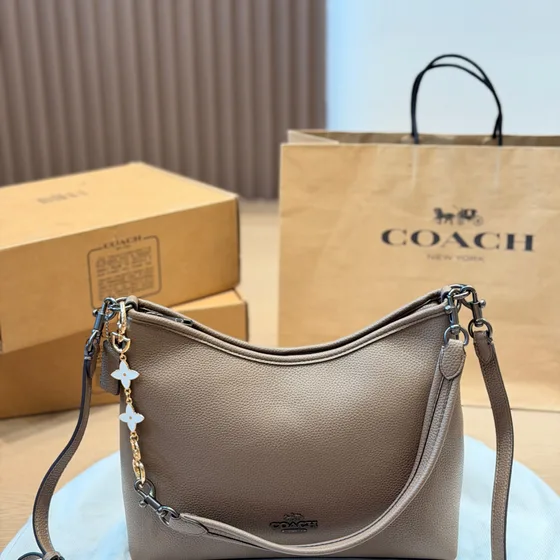 Coach Zip Top Shoulder Bag In Signature Canvas Beige Pink Hobo