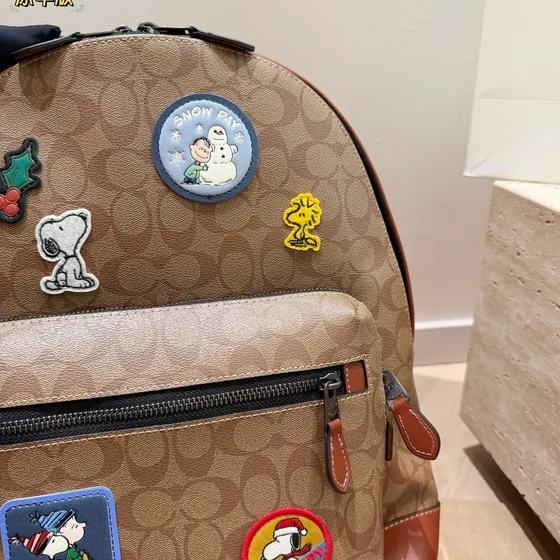 Coach Coach X Peanuts West Backpack In Signature Canvas With Patch Khaki/Brown Backpack