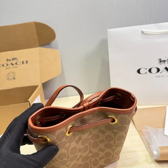 Coach Rowan Bøtteveske In Signature Lerret Khaki/Saddle Crossbody