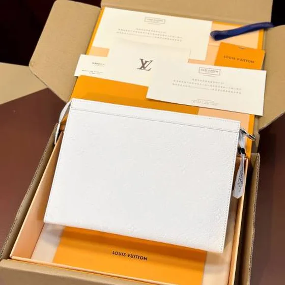 Louis Vuitton Pochette Voyage White business