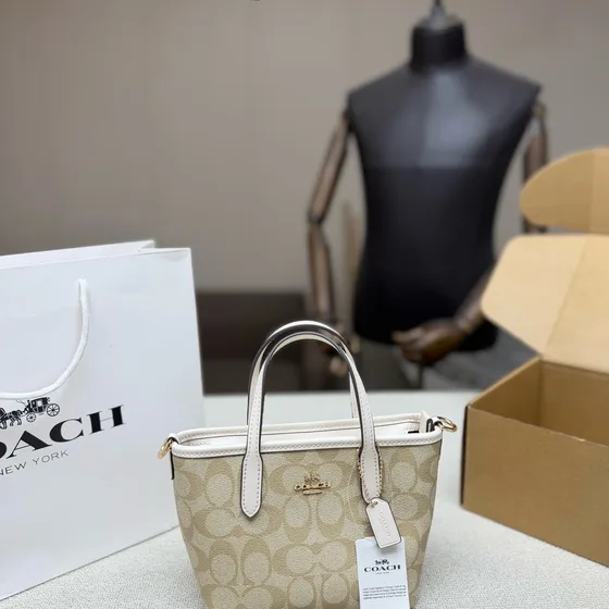 Coach City Mini Tote Bag In Signature Canvas Light Khaki Light Saddle Tote Bag
