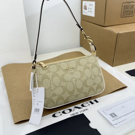 Coach Nolita 19 In Signature Tuval Dark Kahverengi/Siyah Omuz çantası