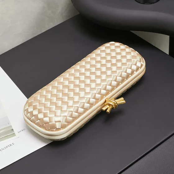 Bottega Veneta Intreccio Knot Clutch Champagne Gold Clutch