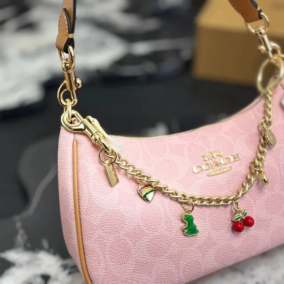 Coach Teri Schoudertas In Signature Doek Roze Schoudertas