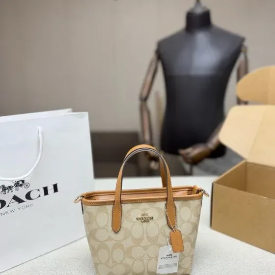 Coach City Mini Tote Bag In Signature Canvas Light Khaki Light Saddle Tote Bag