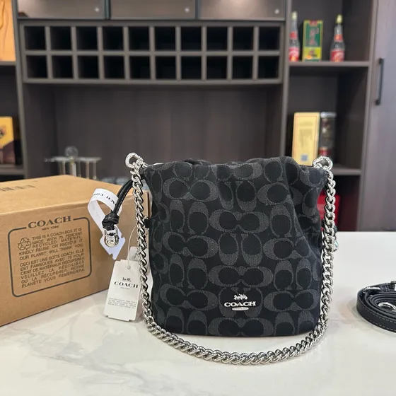 Coach Drawstring Crossbody In Signature Denim Blue Crossbody