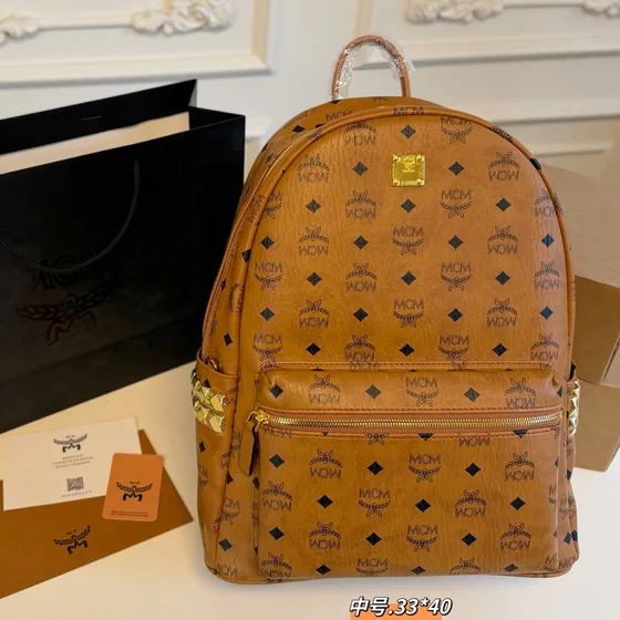 MCM Stark Backpack Cognac White Beige Pink Black 33 40 Backpack