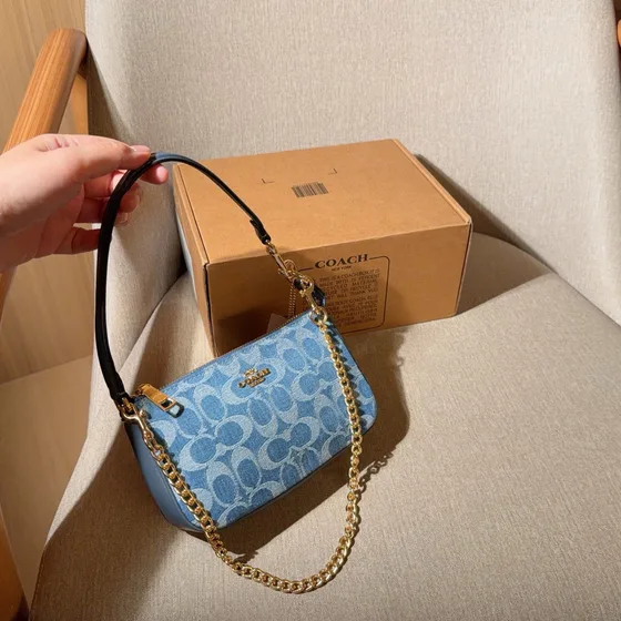 Coach Nolita 19 In Signature Chambray Blauw Schoudertas