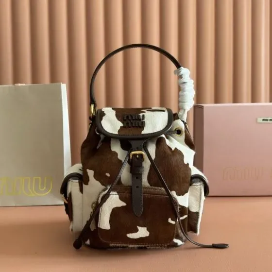 Miu Miu Calf Hair Printed Pocket Backpack Brown And White Cow Print Backpack