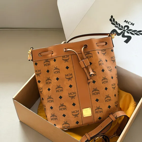 MCM Aren Visetos Drawstring Bucket Bag Cognac Crossbody