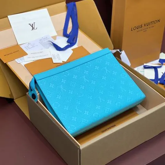 Louis Vuitton Pochette Voyage Turquoise Taiga everyday