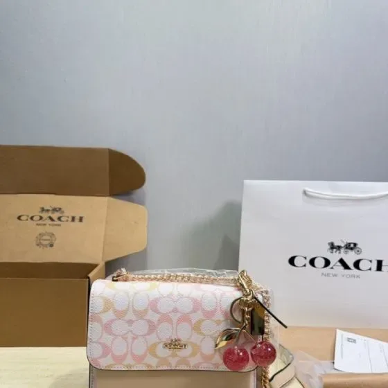Coach Mini Klare Crossbody In Signature Canvas Light Pink Yellow White Crossbody