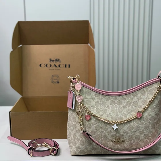 Coach Laurel Bolso bandolera In Signature Lona Powder Rosa Bolso bandolera