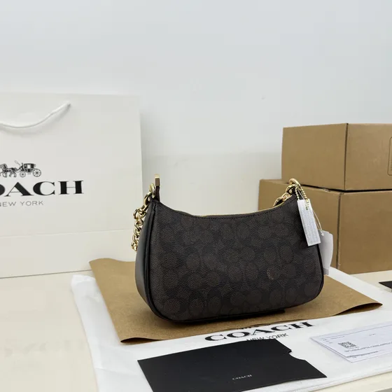 Coach Teri Bolso bandolera In Signature Lona Marrón Negro Bolso bandolera