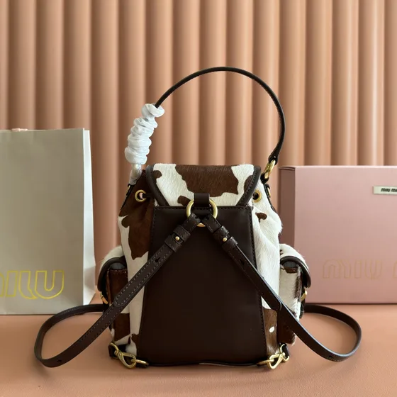 Miu Miu Calf Hair Printed Pocket Backpack Brown And White Cow Print Backpack