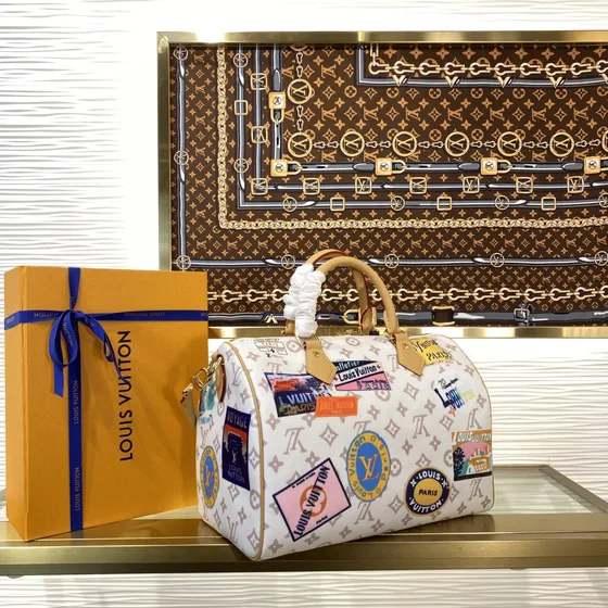 Louis Vuitton Speedy Bandouliere Hvid Tophåndtag